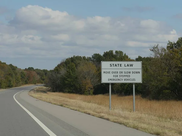 Roadside sign with a State Law printed in it, Oklahoma.
