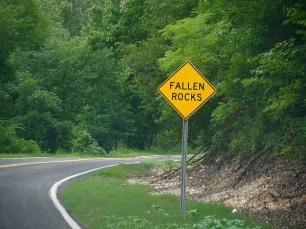 Roadside sign warning for fallen rocks
