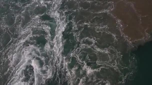 Handheld Downward Shot Ripples Water Created Propeller Ship — Stock Video