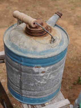 Old rusty watering can sold at a flea market