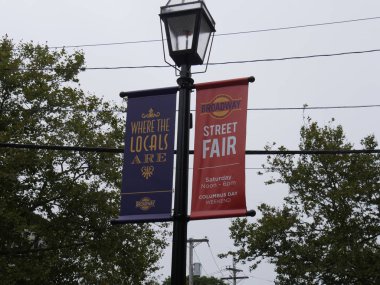 Newport, Rhode Island-September 2017: Upward street signs at Broadway Street, Newport. 