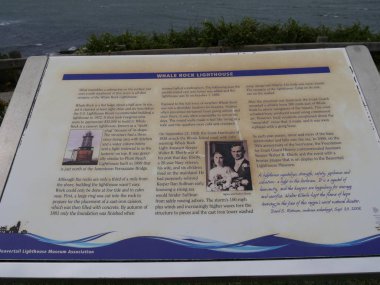 Jamestown, Rhode Island-September 2017: Information board about the Whale Rock Lighthouse. 