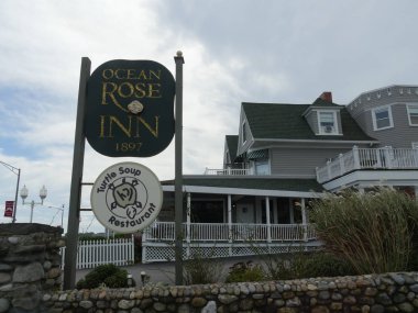 Narragansett, Rhode Island-September 2017: Medium close up of the sign at Ocean Rose Inn, one of the hotels offering an ocean view in Narragansett.