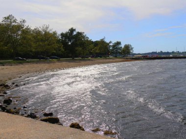 Newport, Rhode Island-September 2017: Riplles in the water at a beach near the Newport Harbor.