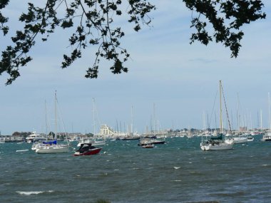 Newport, Rhode Island-September 2017: Windy day at the Newport Harbor, with sailboats in the lagoon.