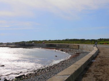 Newport, Rhode Island-September 2017: Coastal view along Ocean Drive with a seawall.