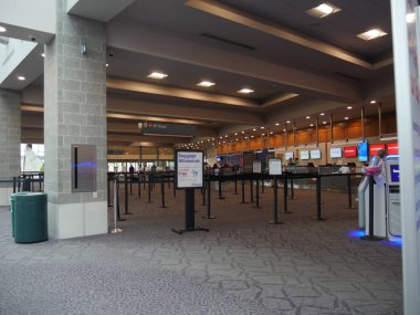 Newport, Rhode Island-September 2017: Fenced areas to the check in counters of different airlines at the T.F. Green Airport in Warwick,  Rhode Island.