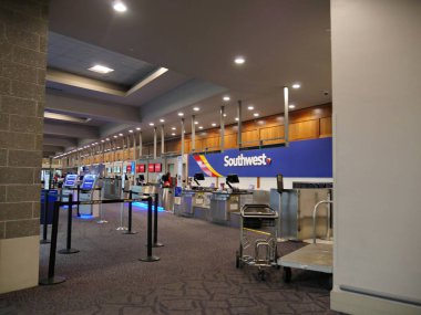 Warwick, Rhode Island-September 2017: Check in counters for Southwest Airlines and other airlines at the T.F. Green Airport.