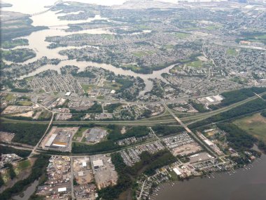 Baltimore, Maryland- September 2017: Aerial photo approaching the Baltimore Washington International Thurgood Marshall Airport on a rainy day.