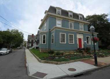 Newport, Rhode Island-September 2017: Row of quaint houses along narrow streets in Newport.