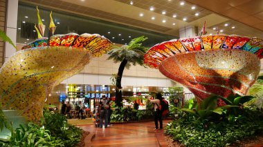 Singapur, Singapur-Mart 2016: Yolcular Changi Havalimanı 'nda hatıra fotoğrafı çekiyor.