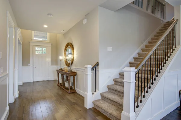 Fabulous foyer features a staircase