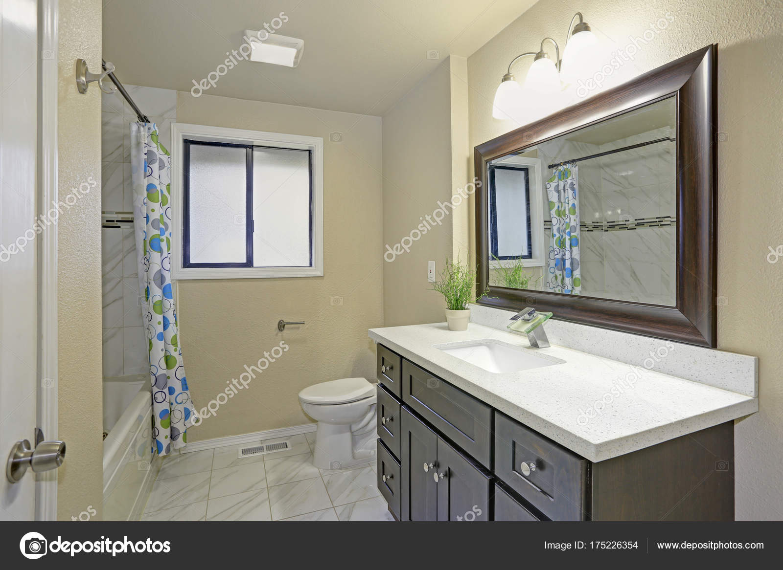 Bright Clean Bathroom Interior With Espresso Vanity Cabinet Bright Clean Bathroom Interior With Espresso Vanity Cabinet