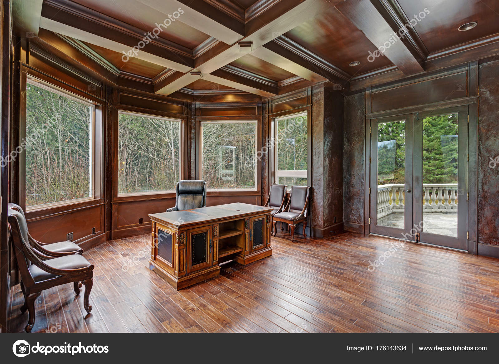 Chic Wood Paneled Home Office Features Coffered Ceiling