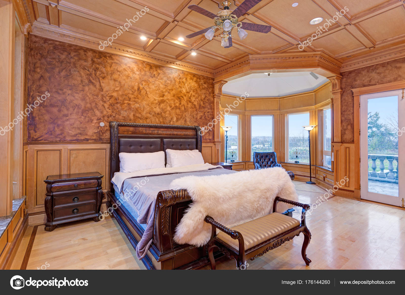 Welcoming Mansion Bedroom With A Rustic Wood Coffered