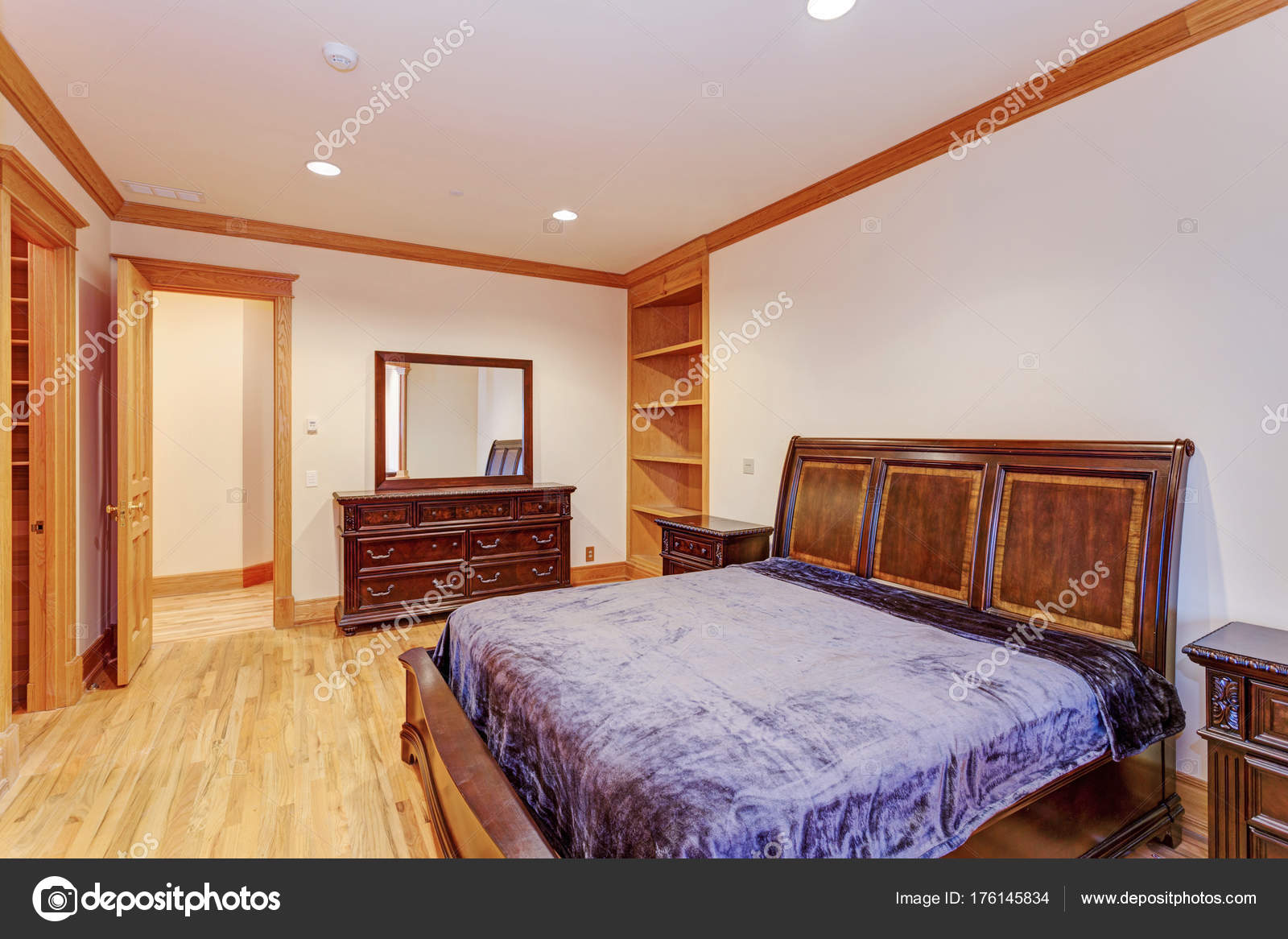Welcoming Mansion Bedroom With A Light Hardwood Floor Stock Photo Welcoming Mansion Bedroom With A Light Hardwood Floor Stock Photo