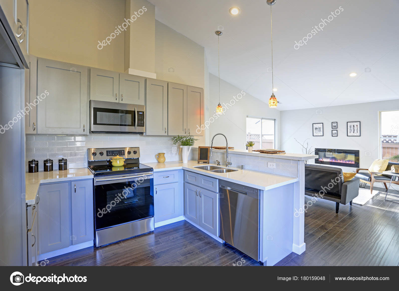 Light Grey Kitchen Room Interior With Vaulted Ceiling Stock