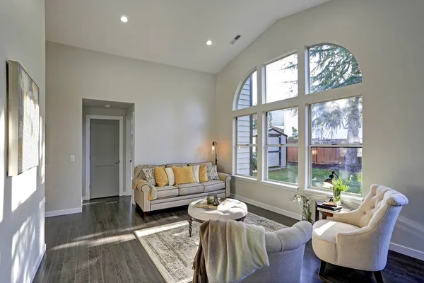 Sun filled family room in soft beige tones. — Stock Photo, Image