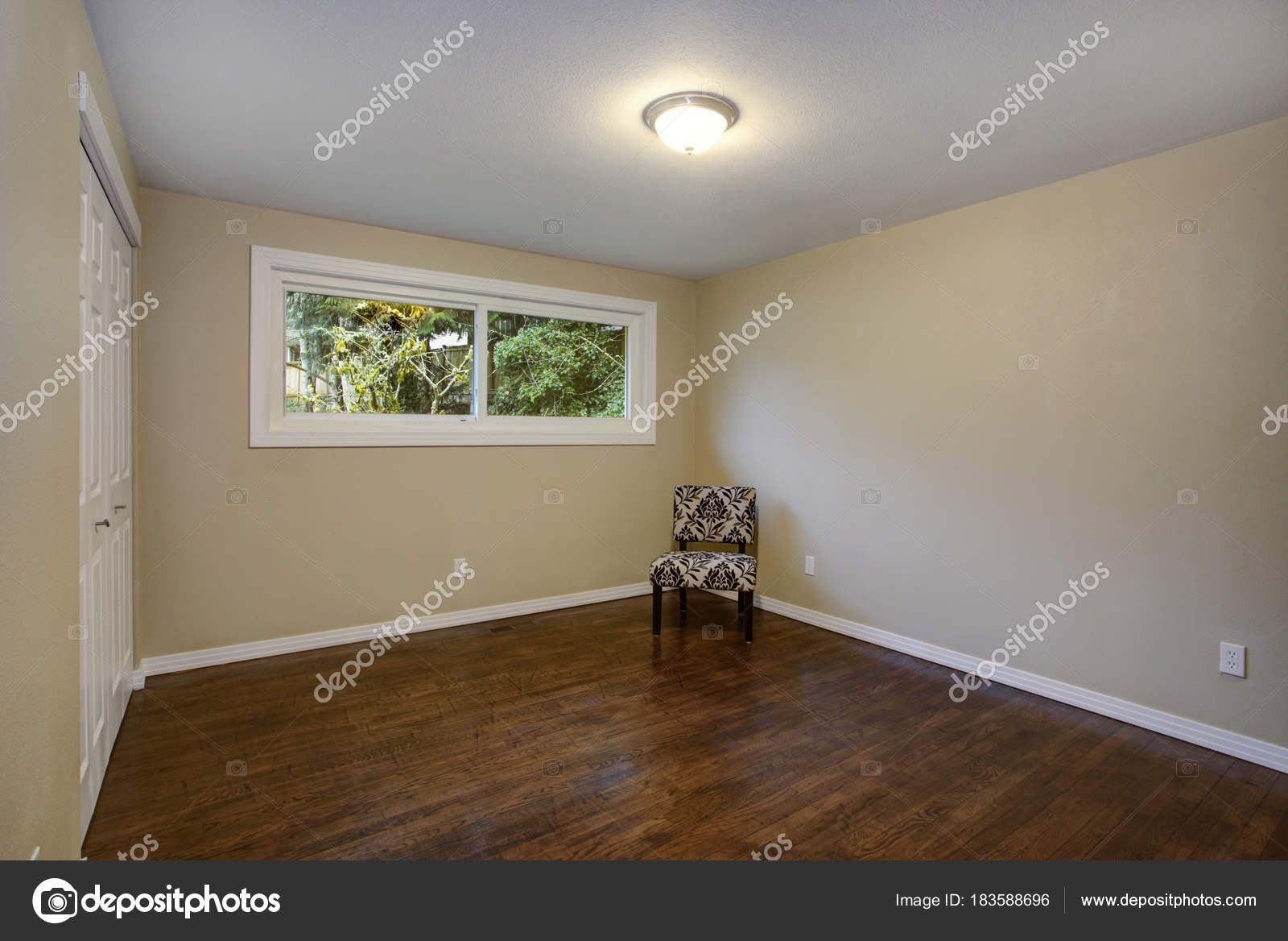 Empty Room Taupe Walls Hardwood Floor In A Luxury Home Stock Empty Room Taupe Walls Hardwood Floor In A Luxury Home Stock Photo