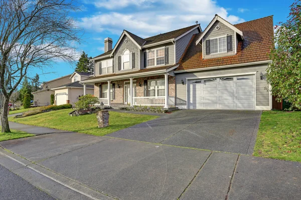 Gray mixed siding home with nice landscaping — Stock Photo, Image