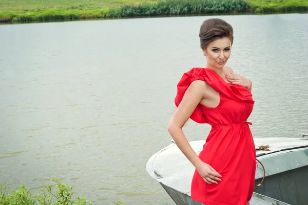 girl on the boat near the lake in summer8