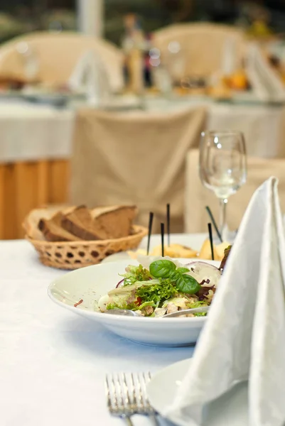 Delicious dishes on the table in the restaurant — Stock Photo, Image