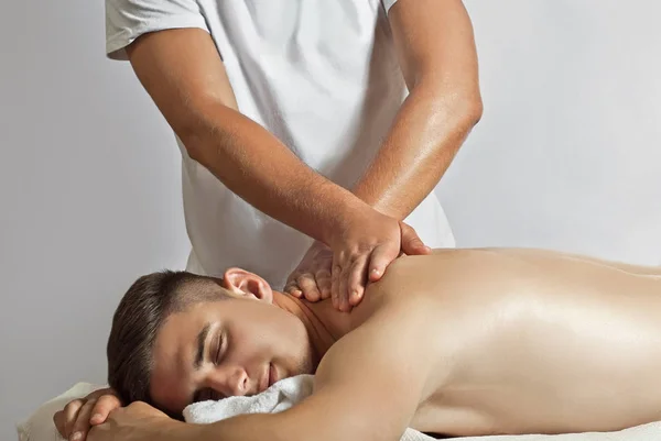 Massage Therapist White Shirt Doing Back Massage Guy Lies Table — Stock Photo, Image