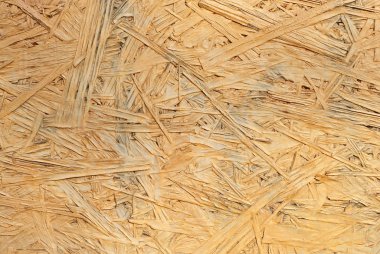 Tahtaların dokusu. Tahta masanın yüzeyi. Talaş ve ahşap atığından fayanslar.