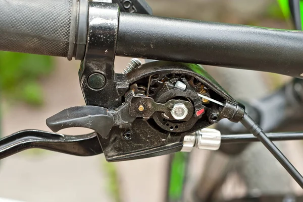 Gear switch from the bike on the handlebars. Disassembled bicycle detail close up.
