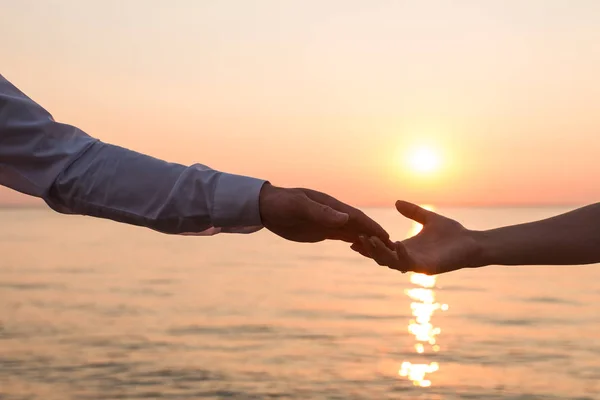 Hands Man Woman Reaching Each Other Royalty Free Stock Photos