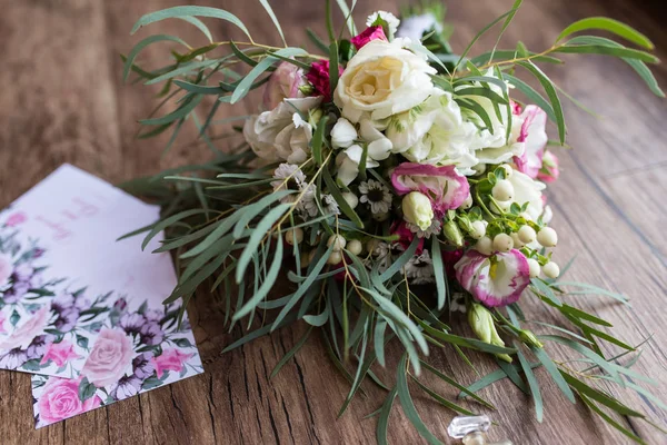 Lush Bridal Bouquet White Roses Lot Greenery Few Invitations Lying — Stock Photo, Image