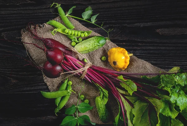 Vegetables from farm to the Thanksgiving beets, peas, cucumbers and squash. The rustic style.