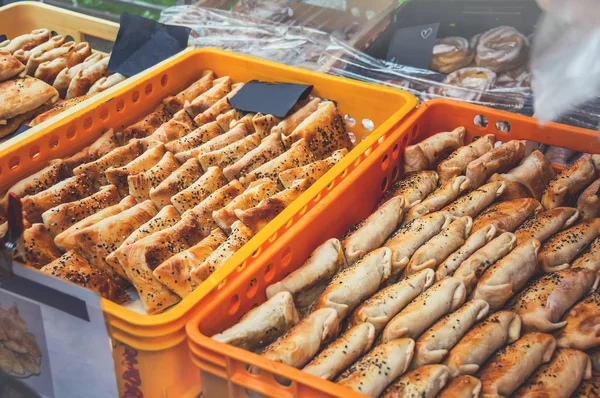 Manufacturer of quick street food, other national dishes for fast food at the farmers market on the streets of Prague. Selective focus.