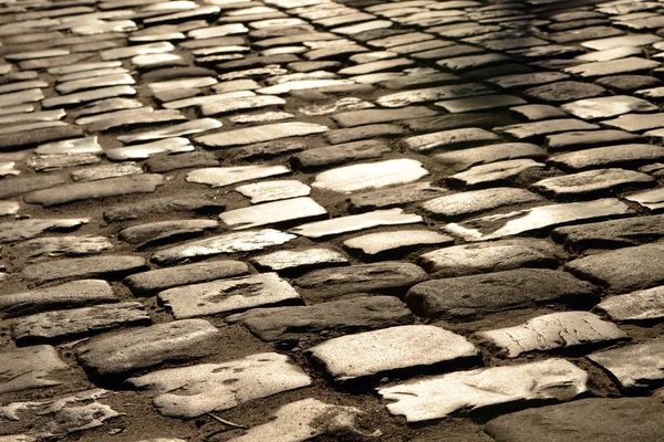 pavement stone, old pavement road, texture of stone pavement, cobblestones, background