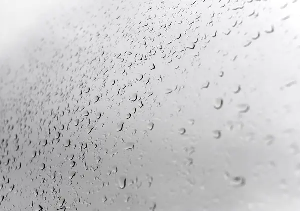 Gotas de agua sobre vidrio — Foto de Stock