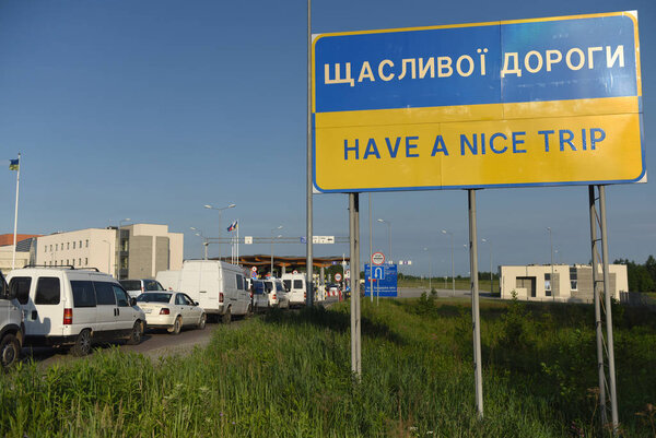 Hrushiv, Ukraine - May 31, 2017: Sign 'Have a nice trip" in Hrushiv-Budomezh checkpoint on the border with Ukraine and Poland some 60kms from city of Lviv.