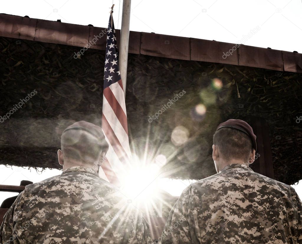 American Soldiers and US Flag with sunlight