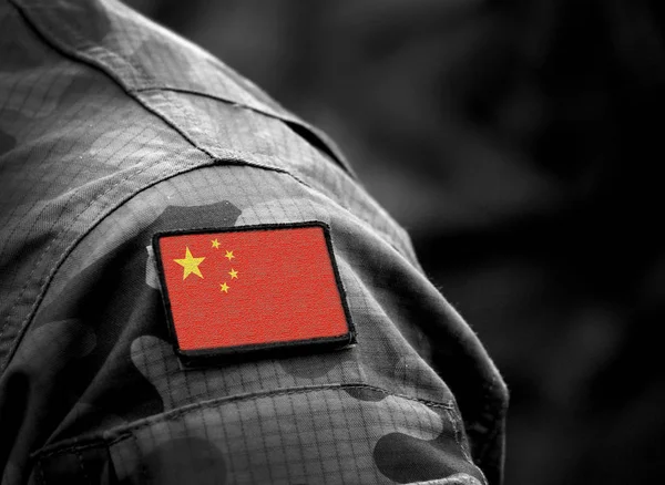 Flag of China on military uniform.