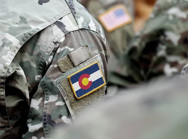 Flag the State of Colorado on military uniform. United States.