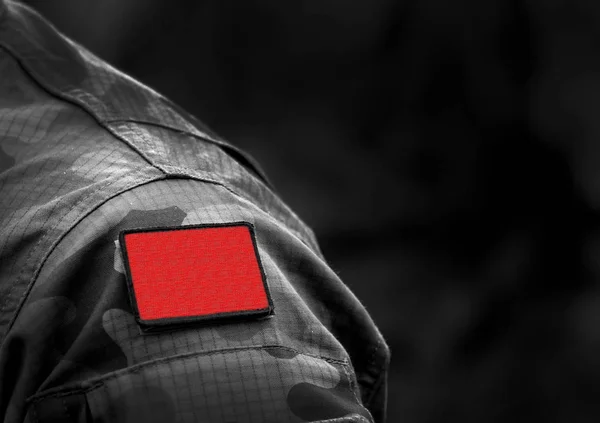 Red flag on military uniform. Socialist or communist red flag. — Stock Photo, Image