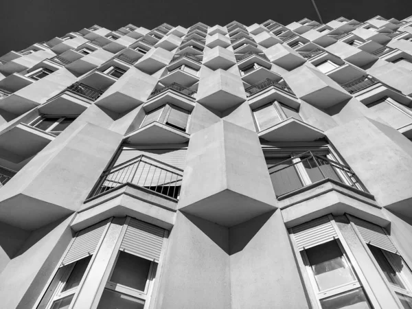 Black and White Photography of Building Facade with sharp shapes