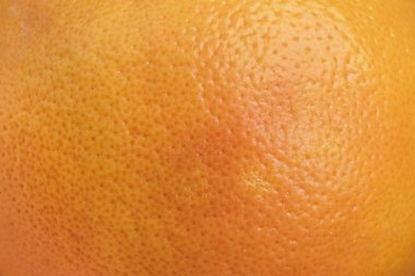 Portakal kabuğu yüzey portre. Narenciye kabuğu yapısı arka plan.