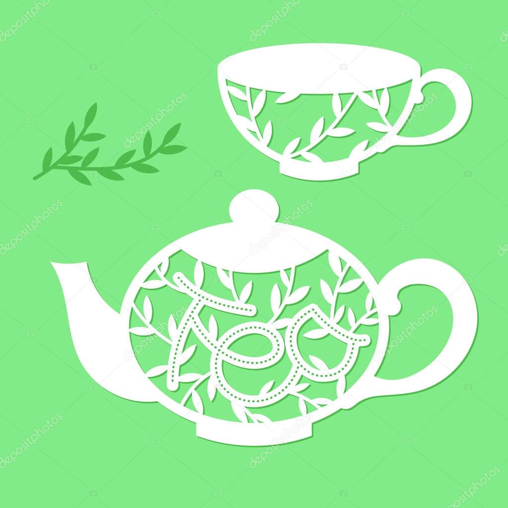 Openwork teapot and cup with a floral pattern and the word tea.