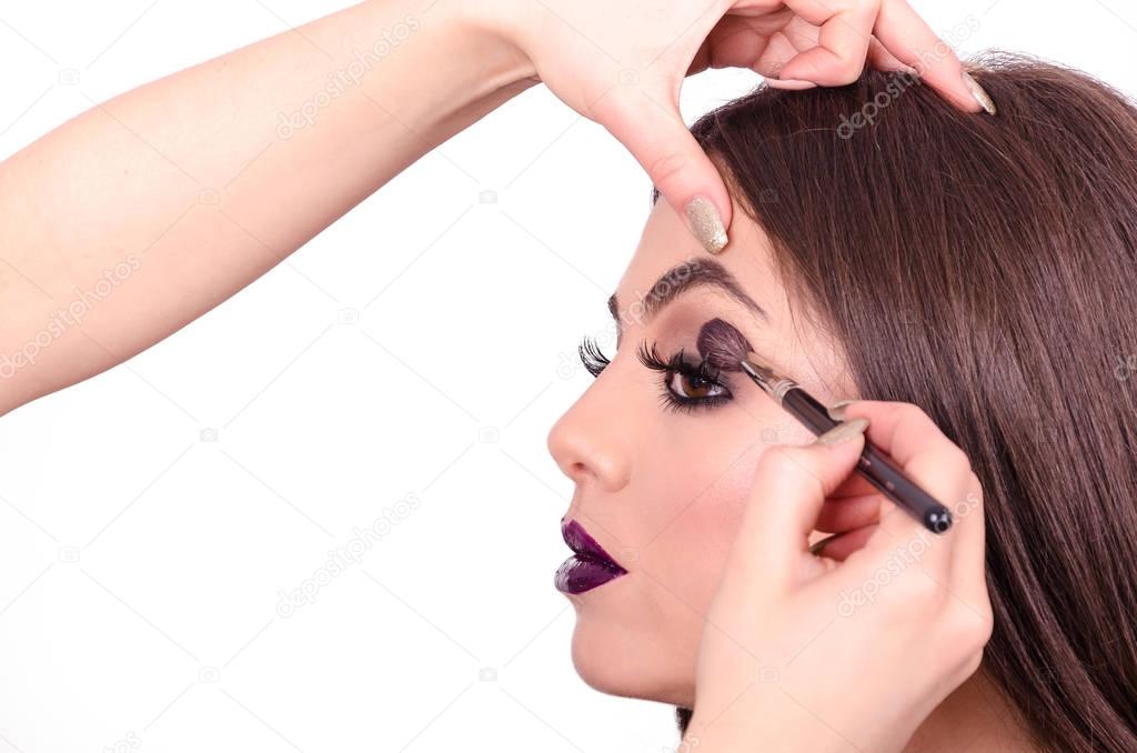  girl doing make up  