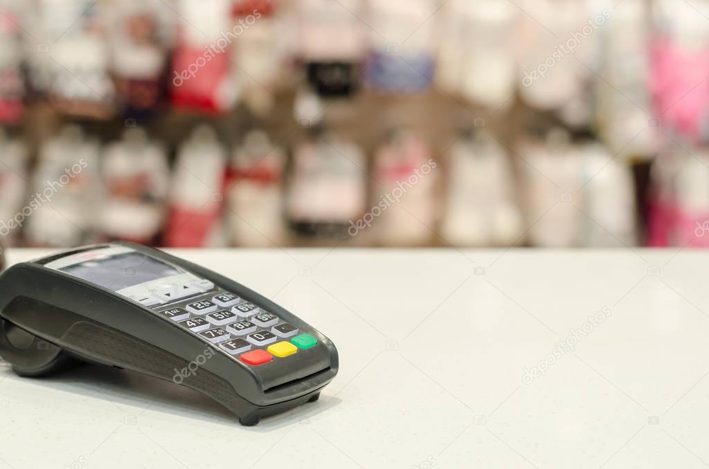 card reader on the table in the store