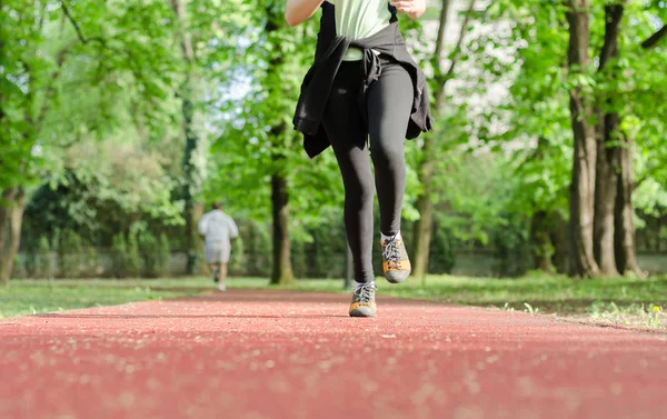 girl running in the distance