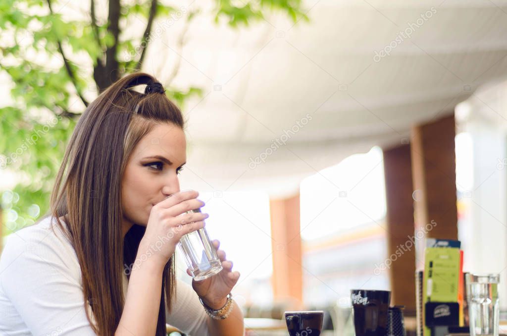 woman drinking  glass of water 