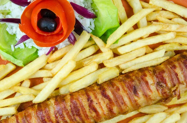 Rolled chicken with french fries