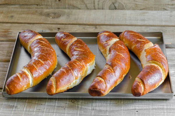 Bavarian rolls in a metal bowl — Stock Photo, Image