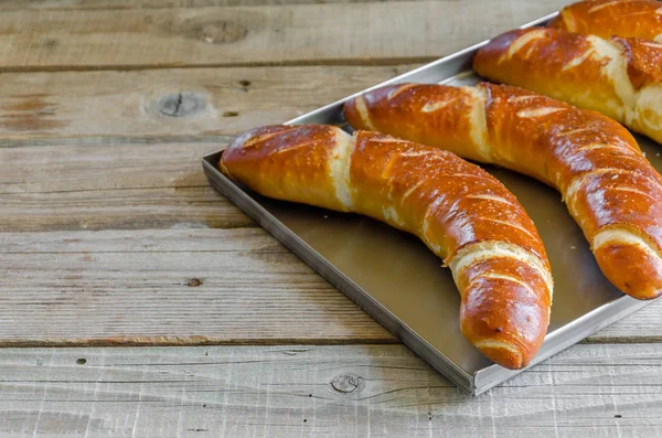 Bavarian rolls in a metal bowl — Stock Photo, Image